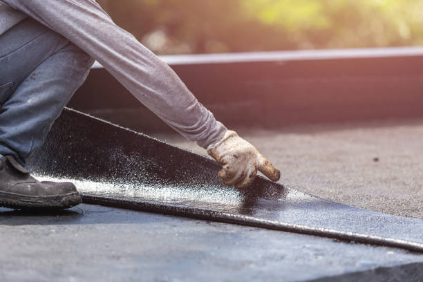 Professional Waterproofing technician working in Darien, GA